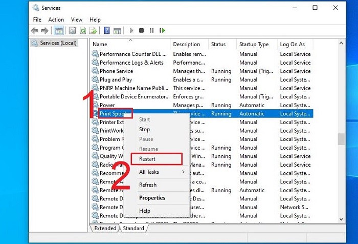 Khởi động lại Print Spooler để sửa máy in tạm dừng