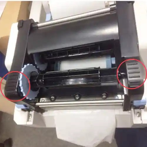 Khóa đầu in sau khi lắp giấy tem